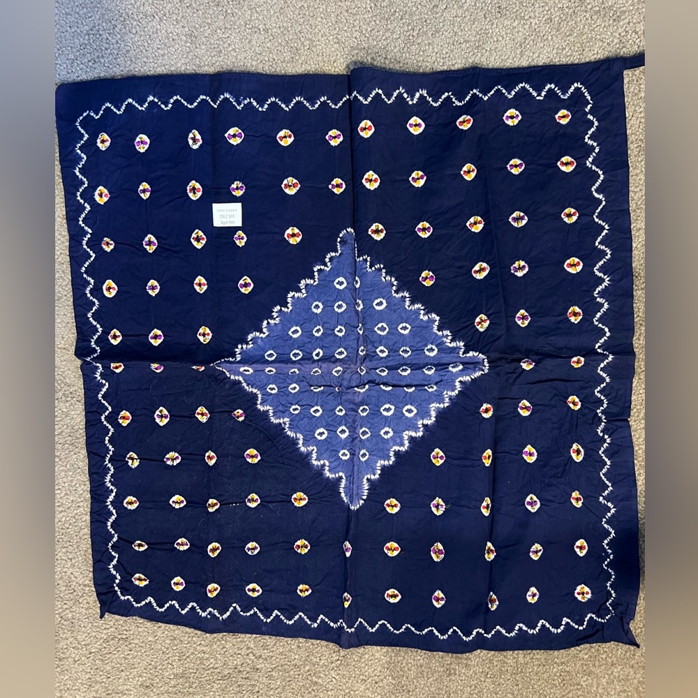 Navy scarf with print.